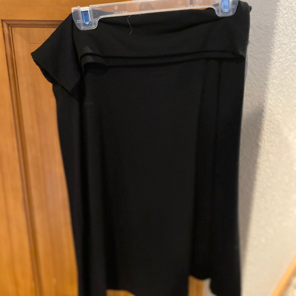 Black stretchy mid length pencil skirt